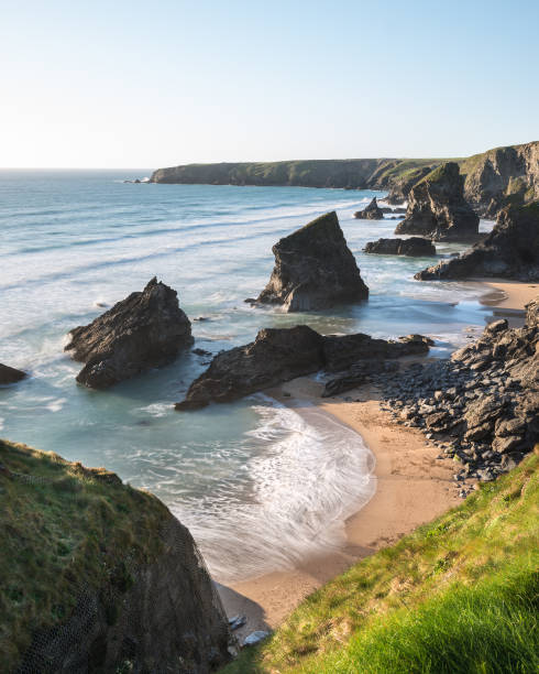istock Stunning dusk sunset landscape image of Bedruthan Steps on West Cornwall coast in England 958172688