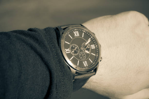 istock Modern men`s watch, brown-gold color 958184938