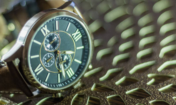 istock Modern men`s watch, brown-gold color 958185274