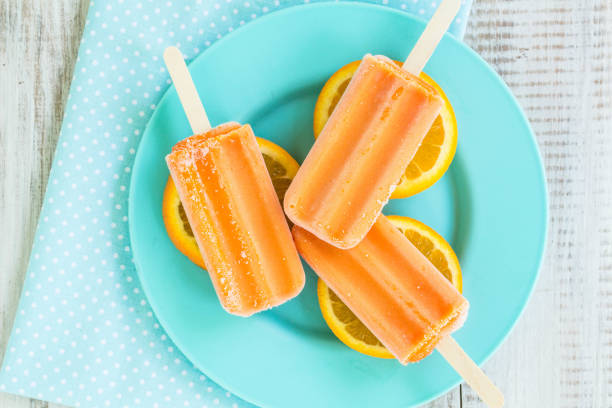 istock Popsicle Summer Treat On Plate With Ice 958192010