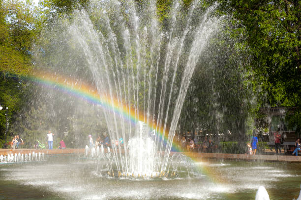 istock Rainbow in a city fountain 958197994