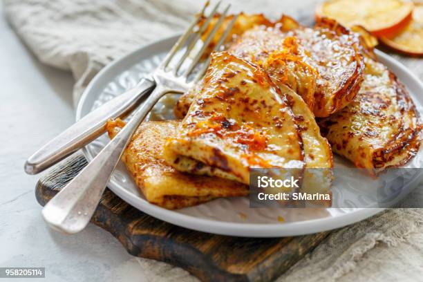 Thin Crepes With Orange Sauce Stock Photo - Download Image Now - Crêpe - Pancake, Orange Color, Dessert - Sweet Food