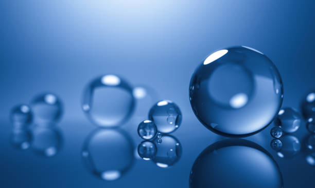 istock abstract glass spheres or plastic ball - blue background - 3d illustration rendering 958205344