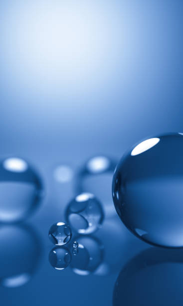istock abstract glass spheres or plastic ball - blue background - 3d illustration rendering 958205352