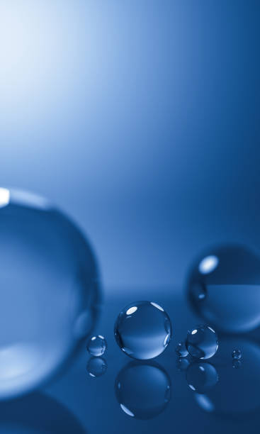 istock abstract glass spheres or plastic ball - blue background - 3d illustration rendering 958205356