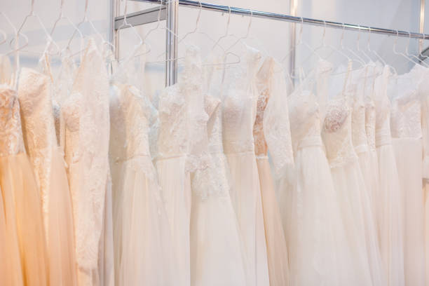 istock Rack with a lot of chic wedding dresses. 958210228