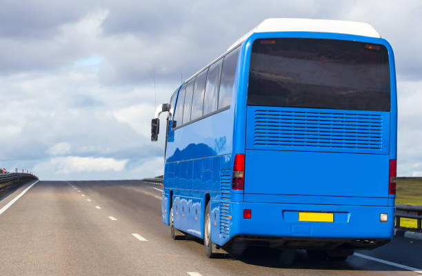 istock Bus Moves on Country Road 958210268
