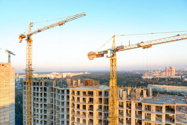 istock Cranes on industrial building site 958221250