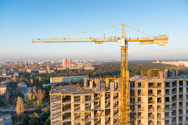 istock Cranes on industrial building site 958221284