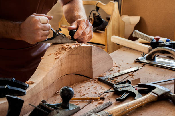 istock Joiner Makes Cabriole Leg for Vintage Table 958221510