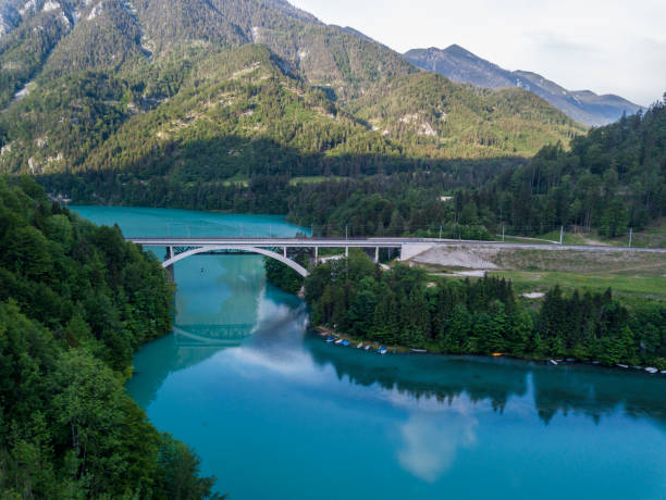 istock Railway bridge crossing the dammed Steyr river, Austria 958225168