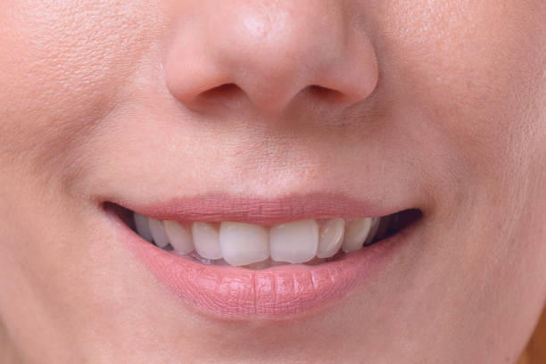 istock Smiling friendly blond woman with green eyes 958225444