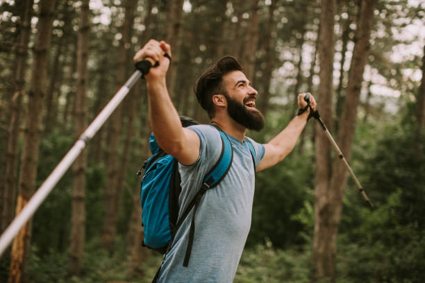 istock Young bearded hiker in mountain 958237088