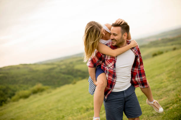 istock Loving coulpe having fun in the spring nature 958237252