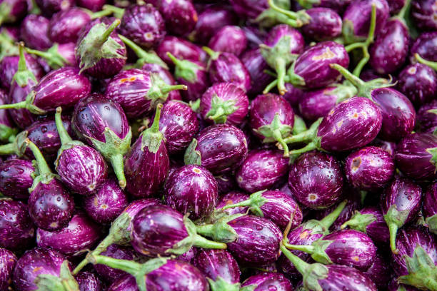istock Vegetables Stand in Asia with Eggplants 958252562