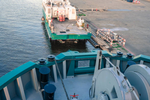 istock Marine vessel is morred starboard side alongside berth 958252820