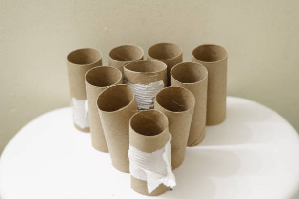 istock Empty Toilet Rolls Stack Up On the back of a toilet 958253542