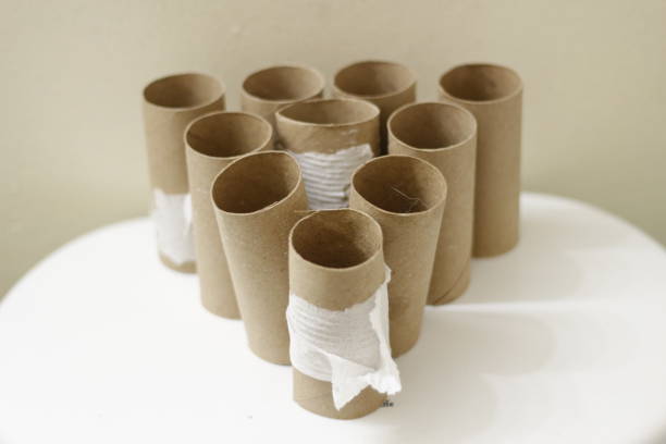istock Empty Toilet Rolls Stack Up On the back of a toilet 958253564