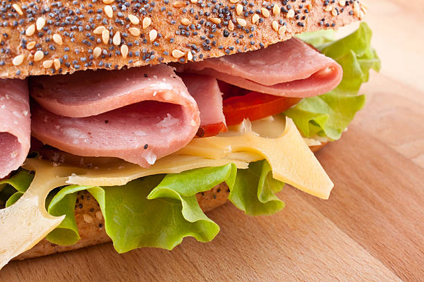 istock long whole wheat baguette sandwich close-up 95825872