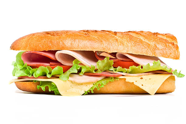 metà della lunga panino baguette - panino submarine foto e immagini stock