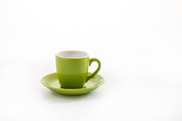 istock cup and saucer isolated on white background 958259572