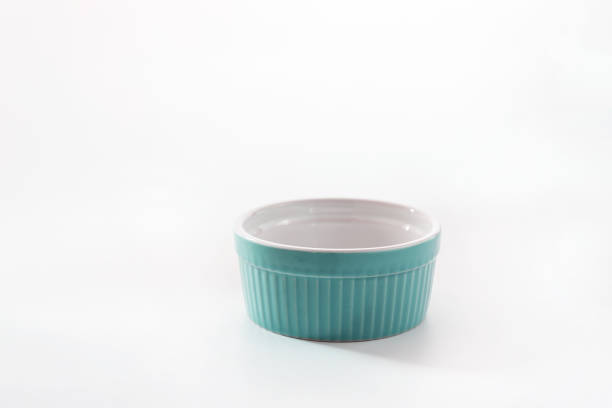 Porcelain souffle ramekin dish isolated on white background stock photo