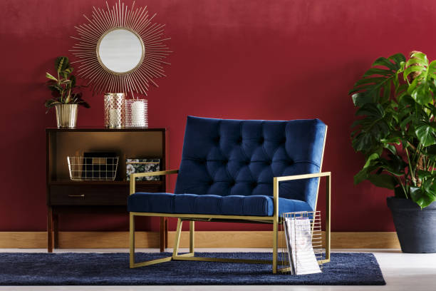 istock Blue armchair with golden frame 958261104
