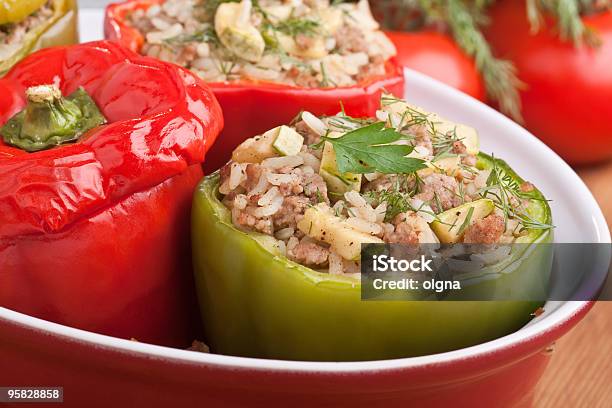Stuffed Peppers In A Dish Stock Photo - Download Image Now - Heat - Temperature, Stuffed Pepper, Baked