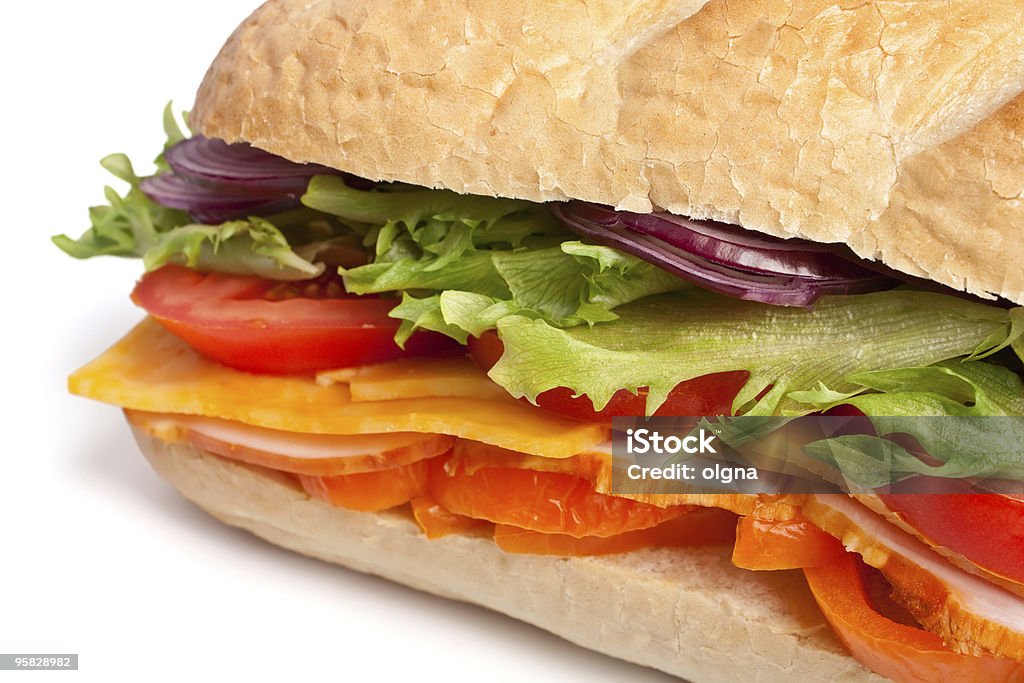 Largo un sándwich de pan francés - Foto de stock de Alimento libre de derechos
