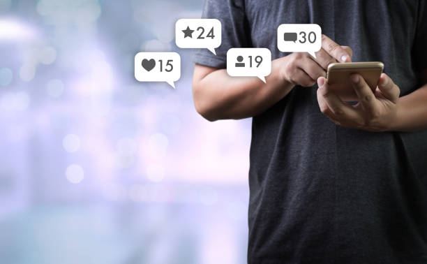 istock Contact us  sms media man use  smart phone social media network pop notification icons 958299968