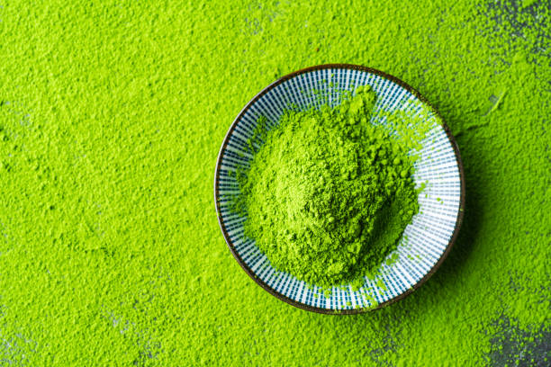 bio au thé vert matcha - herbal medicine green tea crop tea photos et images de collection