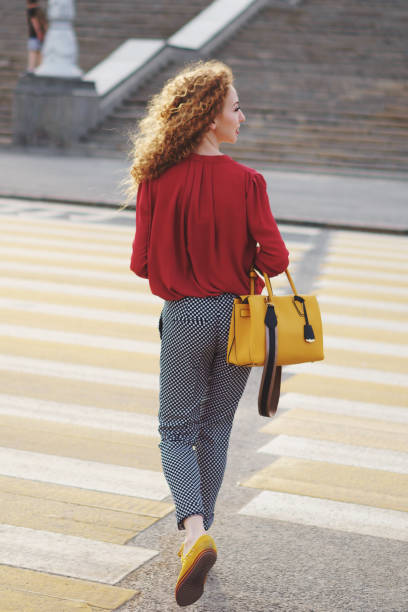 istock Girl with curly hair. Springtime 958314290