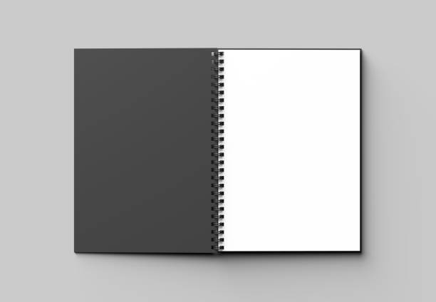 istock Spiral binder notebook mock up with black cover isolated on soft gray background. 3D illustrating. 958318474
