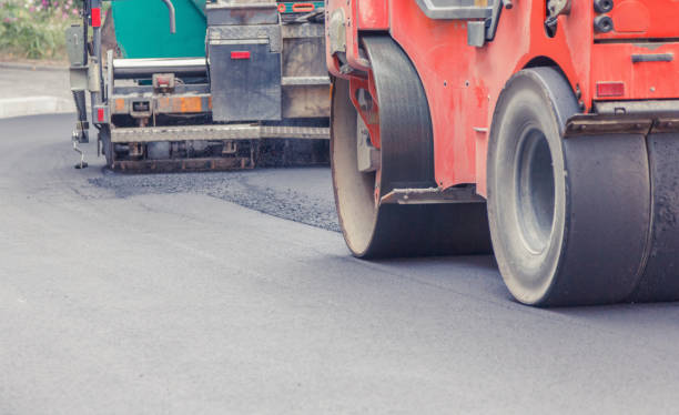 istock Road roller working on the new road construction site 958318496