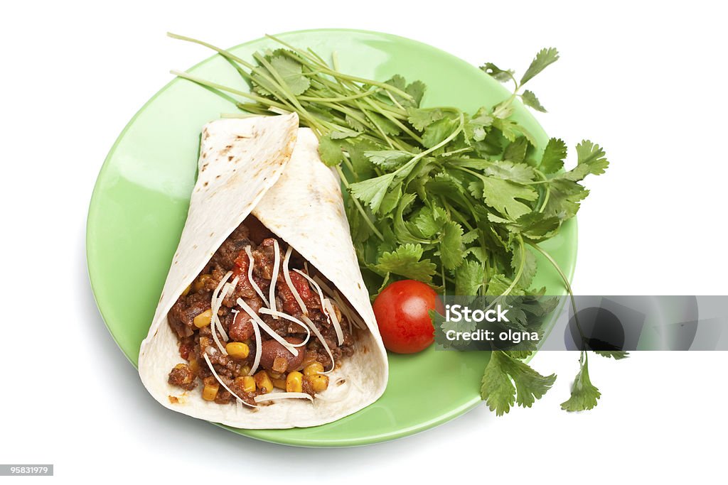 burrito e coriandolo su un piatto - Foto stock royalty-free di Burrito