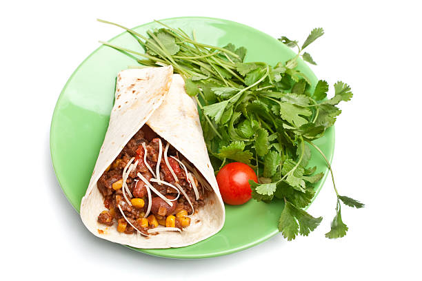 istock burrito and cilantro on a plate 95831979
