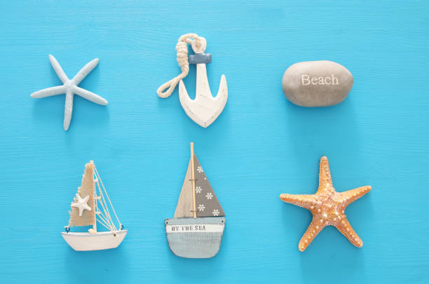 istock nautical, vacation and travel image with sea life style objects. Top view. 958330382