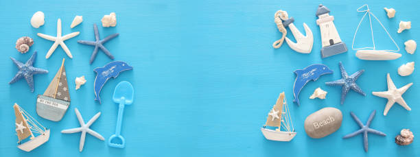 istock nautical, vacation and travel banner with sea life style objects. Top view. 958330522