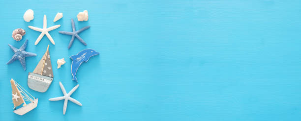 istock nautical, vacation and travel banner with sea life style objects. Top view. 958331406