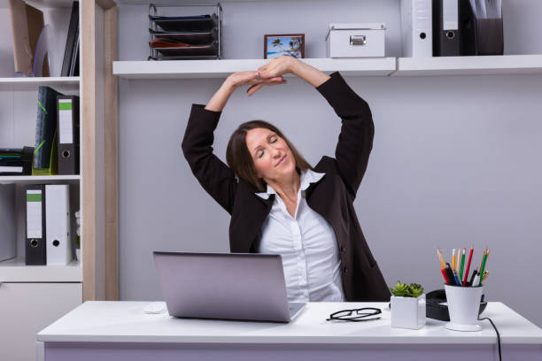 istock Businesswoman Stretching Her Arms 958332438