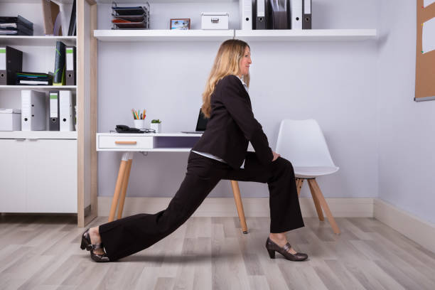 istock Businesswoman Doing Stretching Exercise 958332462