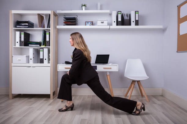 istock Businesswoman Doing Stretching Exercise 958332476