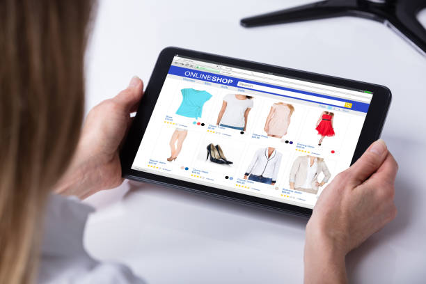 istock Woman Shopping Online On Digital Tablet 958332842