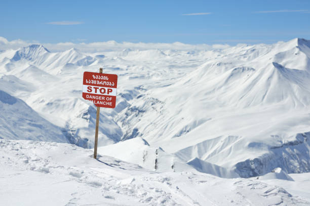 istock warning signs of avalanche on slopes 958335252