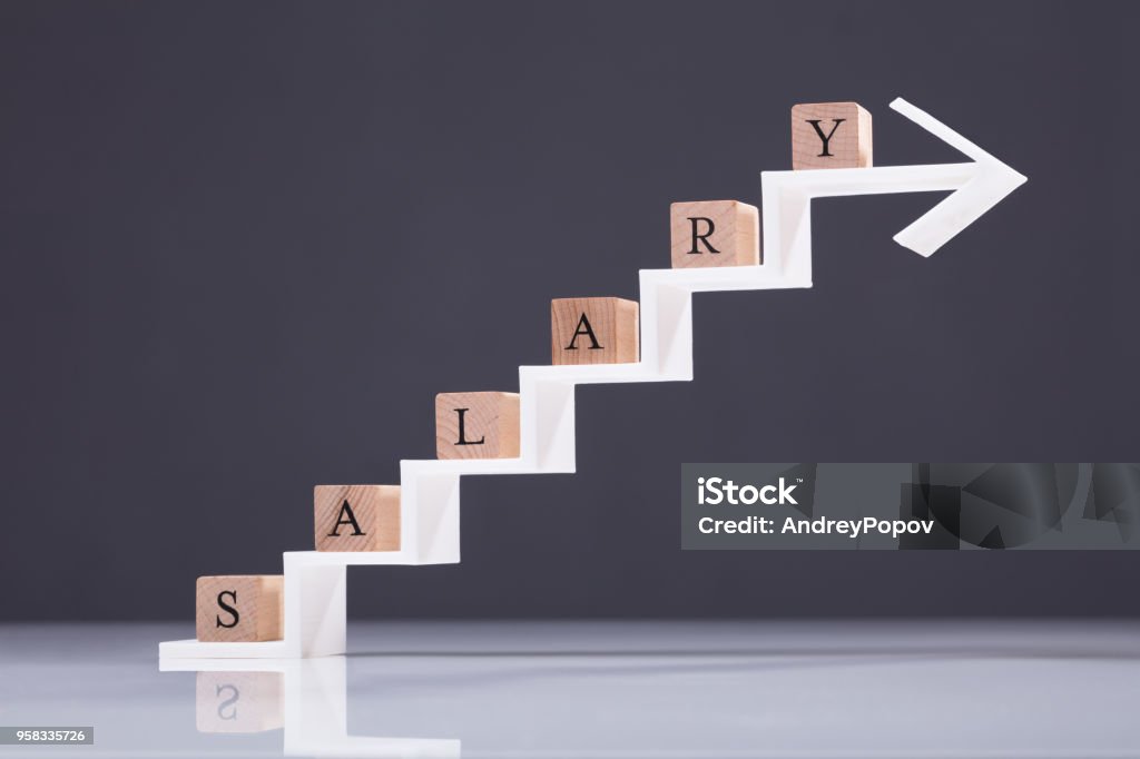 Wooden Block On White Arrow Wooden Block With Salary Text On Increasing Arrow Against Grey Background Wages Stock Photo