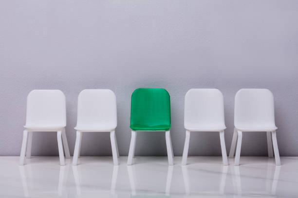 istock Empty Small Chair In Row On Grey Background 958335860