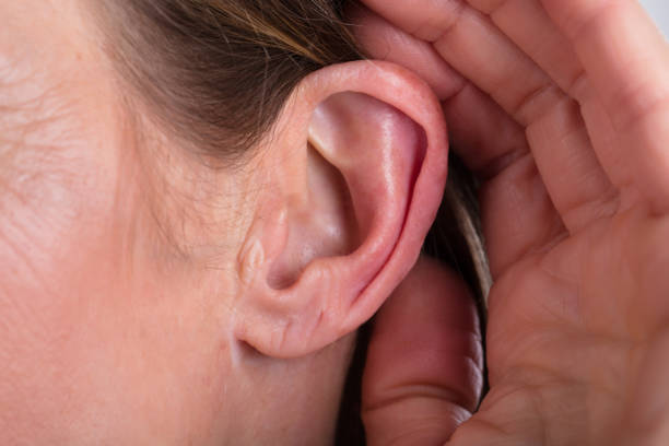 istock Female Hand On An Ear 958335942