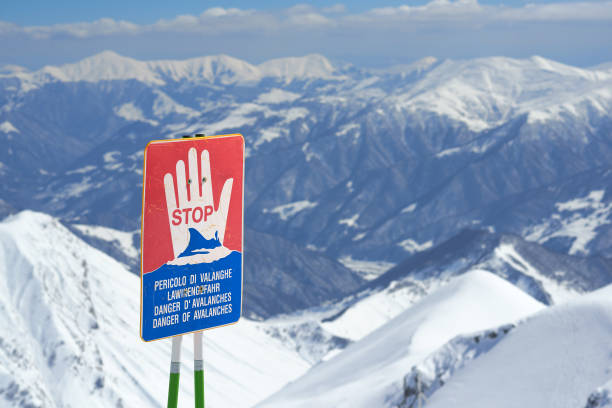 istock warning signs of avalanche on slopes 958336118