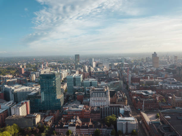 istock Manchester City Centre Drone Aerial View Above Building Work Skyline Construction Blue Sky Summer Beetham Tower Deansgate 958336212