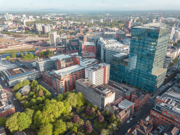 istock Manchester City Centre Drone Aerial View Above Building Work Skyline Construction Blue Sky Summer Beetham Tower Deansgate 958336396